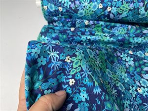 Bomuldsjersey - flotte og livlige blomster i blå toner